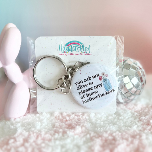 You Are Not Alive To Please Any Of These Motherfuckers 1.5" Keychain