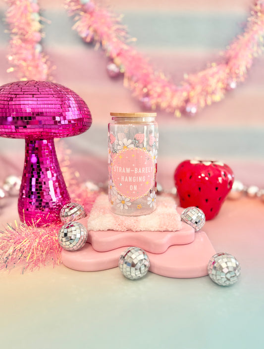 Straw-Barely Hanging On Glass Can