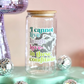 Glass jar with a motivational quote on a colorful background with disco balls and a disco mushroom.
