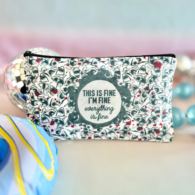 Small pouch with text and decorative elements on a colorful background